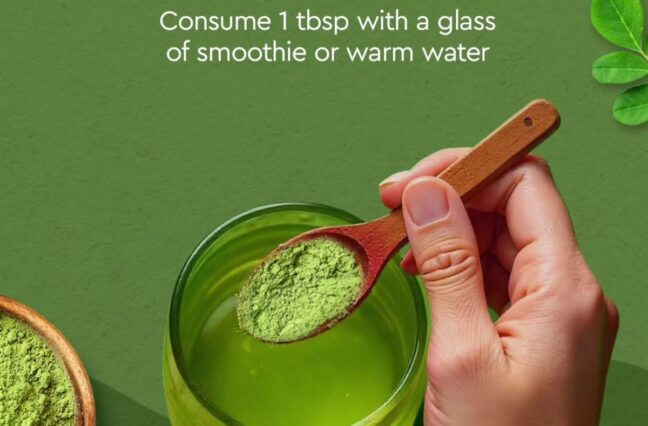 Moriva Organics Moringa Powder 200g pouch with a wooden spoon of green powder