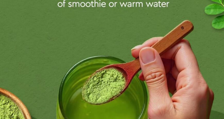 Moriva Organics Moringa Powder 200g pouch with a wooden spoon of green powder